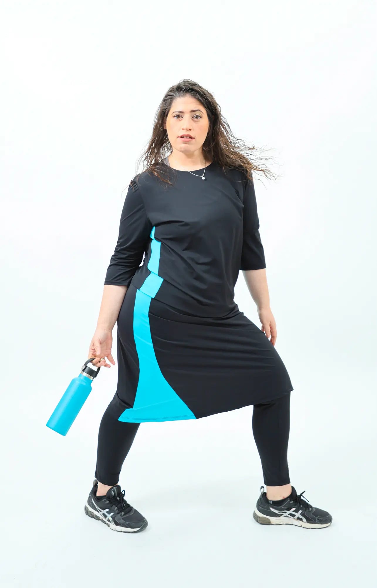 חצאית לאה בצבע טורקיז שחור